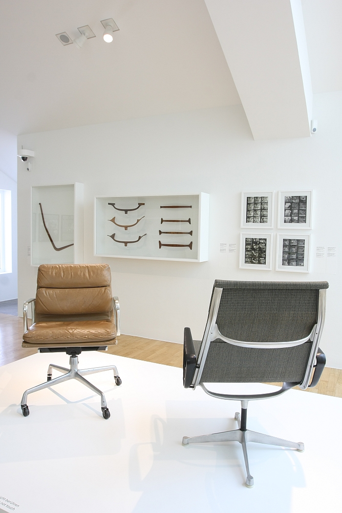 Eames aluminium chiars, and some of the prototypes, as seen at Charles & Ray Eames. The Power of Design, Vitra Design Museum