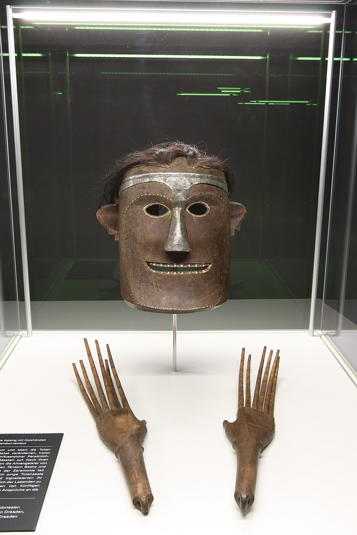 A dancers mask and wooden hands, fromToba-Batak Sumatra, as seen at Tod & Ritual - Kulturen von Abschied und Erinnerung, Staatliches Museum für Archäologie Chemnitz