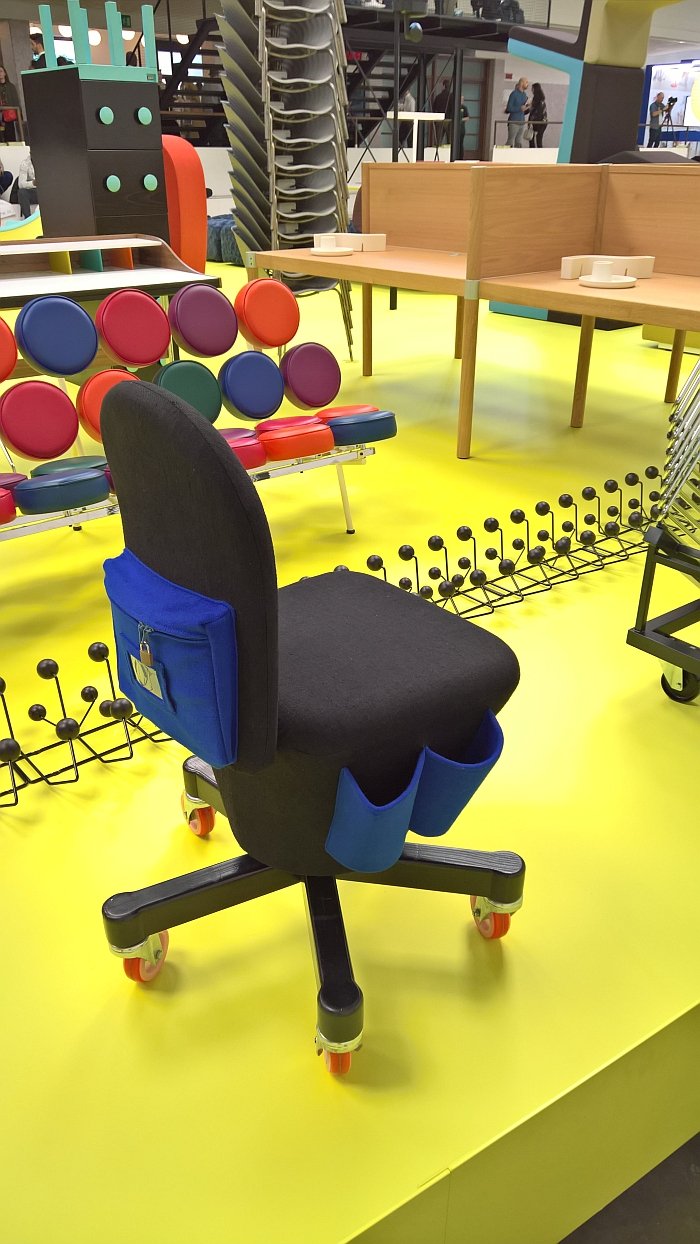 A Citizen Office Chair, and in the background a black/turquoise filing cabinet, by Ettore Sottsass, as seen at Vitra - Typecasting, Milan Design Week 2018