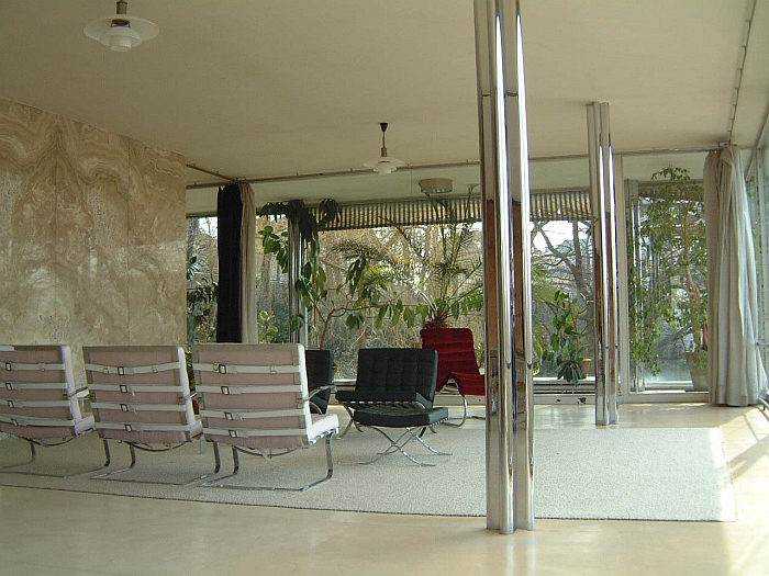 The living room at Villa Tugendhat by Lilly Reich Mies van der Rohe, including in the foreground the Tugendhat Chair (clue: also in all probability primarily Lilly Reich)