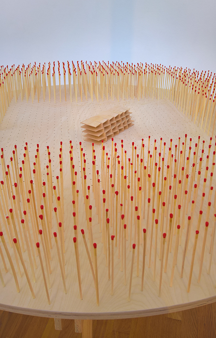 On reflection, building a wooden house in a forest of matches might not have been the best idea..... Growing Stock by Ayşin İpekçi and Kamiel Klaasse