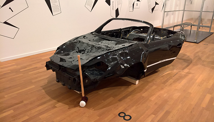 A seriously thwacked Porsche, and a metaphor, as seen at School of No Consequences. Exercises for a New Life at the Museum für Kunst und Gewerbe, Hamburg