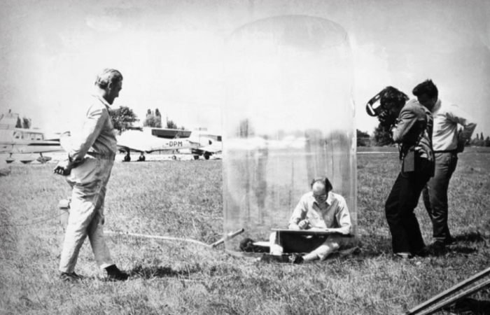 Hans Hollein at work in his Mobile Office under the watchful eye of ORF