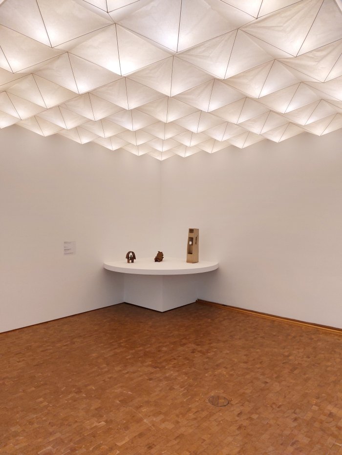 Akari PL2, and ceramic works, by Isamu Noguchi, as seen at Isa­mu Noguchi, Muse­um Lud­wig, Cologne