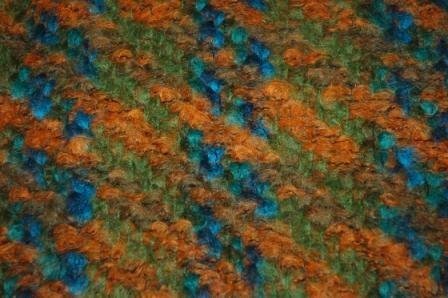 A 1960s mohair tweed by Bernat Klein in browns, orange, blues and greens (Image via Heriot-Watt University's Bernat klein collection on JSTOR)