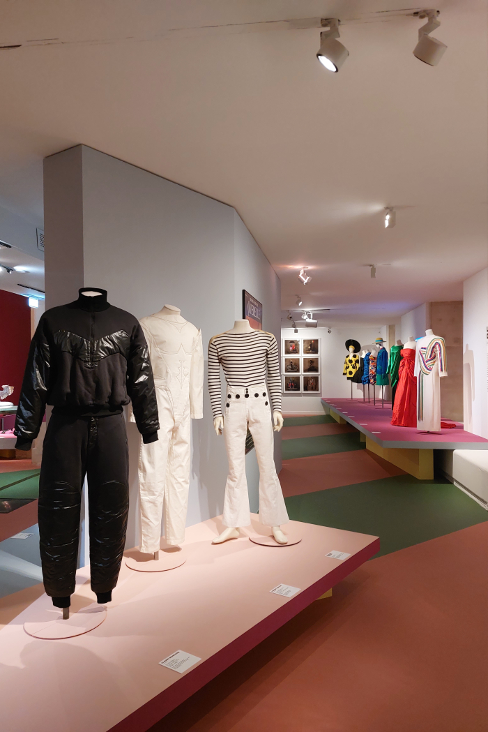 Men's clothing by (l to r) Claude Montana, Thierry Mugler, Jean Paul Gaultier and female Haute Couture, as seen at Années 80. Mode, design et graphisme en France, Musée des Arts décoratifs, Paris