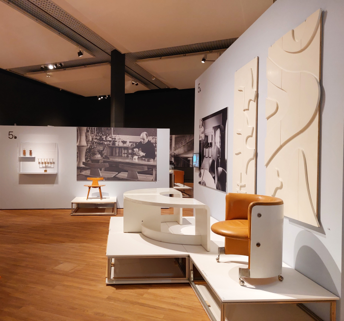 A wooden chair by Viktor Holešťák-Holubár (l) and Vojtech Vilhan & Ján Bahna's chair for the Government lounge at Bratislava Airport (r), as seen at Retrotopia. Design for Socialist Spaces at the Kunstgewerbemuseum, Berlin