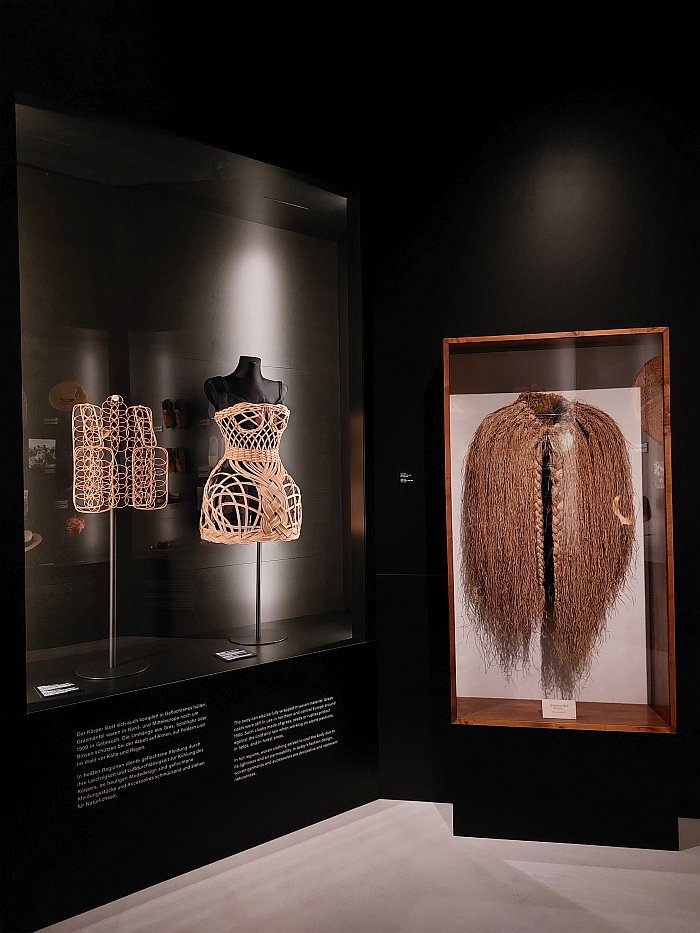 A 19th century Korean rattan vest (l) 21st century rattan Dolce & Gabbana dress (m) and aan Apline grass coat from ca 1900 (r), as seen at All Hands On: Basketry, Museum Europäischer Kulturen, Berlin