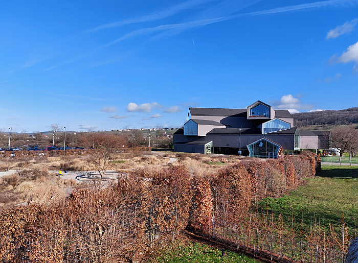 The view across the Piet Oudolf Garden from Tsuyoshi Tane's Garden House to Herzog & de Meuron’s VitraHaus, Vitra Campus, Weil am Rhein (February 2024)