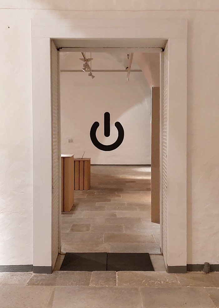 The all-dominant International Electrotechnical Commission 'Power ' symbol, as seen at Uneversum: Rhythms and Spaces, Estonian Museum of Applied Art and Design, Tallinn