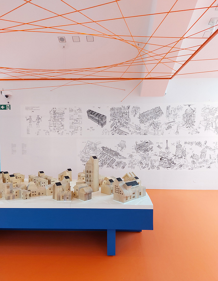 A model of Solarville by Space10 and the mural Human Power Plant by Kris de Decker and Melle Smets, as seen at Transform! Designing the Future of Energy, Vitra Design Museum, Weil am Rhein