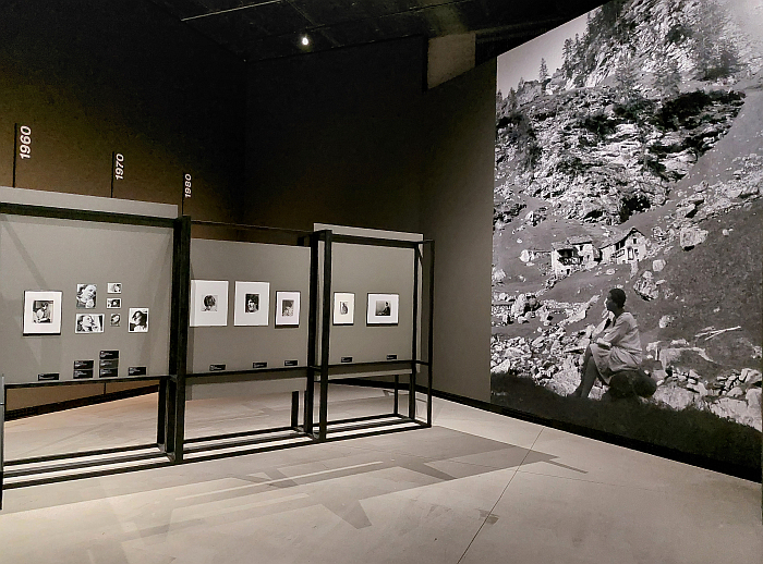 Lucia Moholy, as photographed by László, peruses some of her own photographs of females associated with the Bauhauses, as seen at Lucia Moholy: Exposures, Kunsthalle Praha