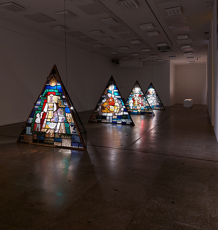 Stained glass windows by Filomena Ušinskaitė for cafe Pasaka, as seen at Fairy Tale. Childhood in Lithuania during the late Soviet era, Kaunas Picture Gallery