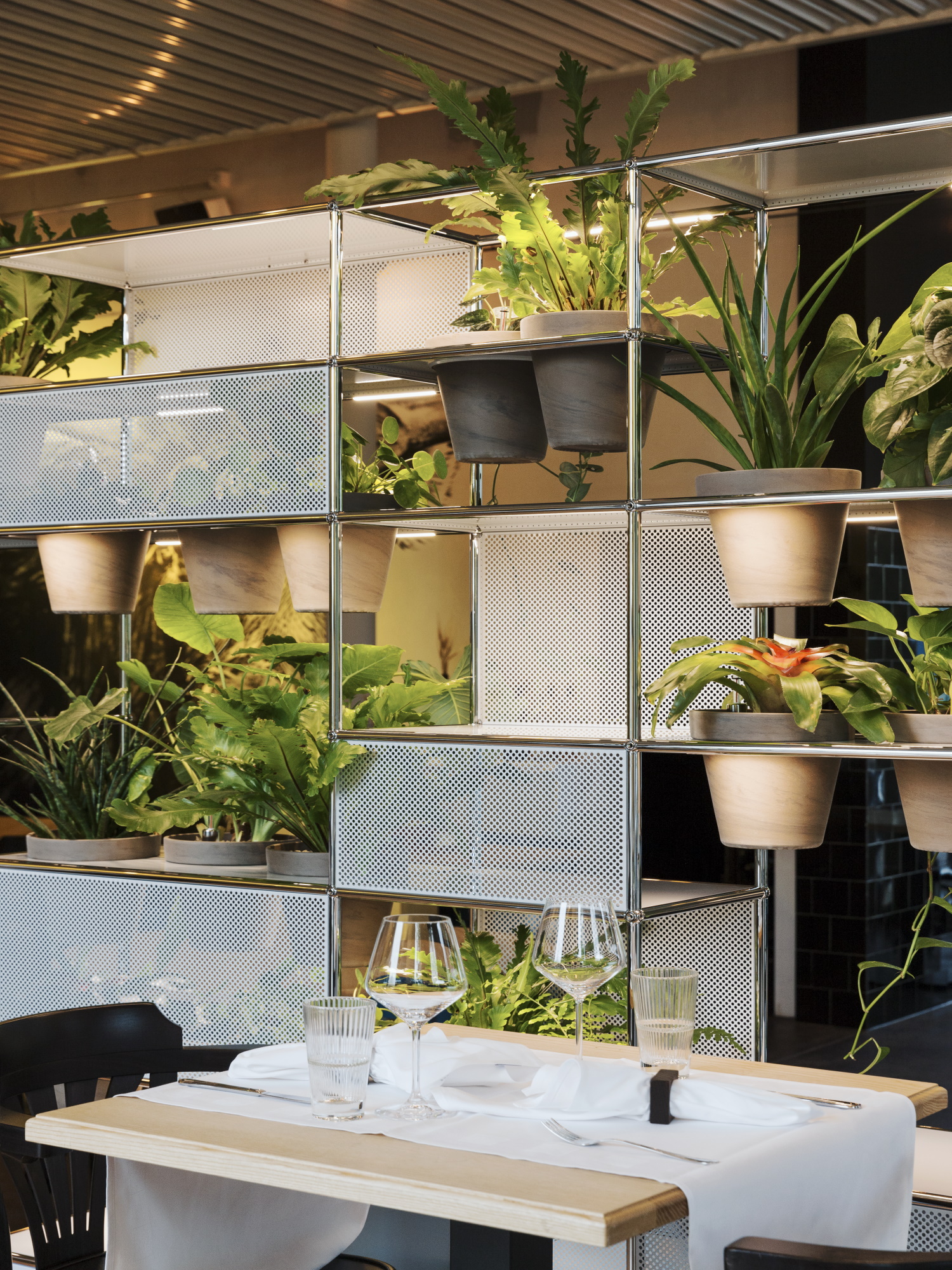 USM Haller shelving with greenery